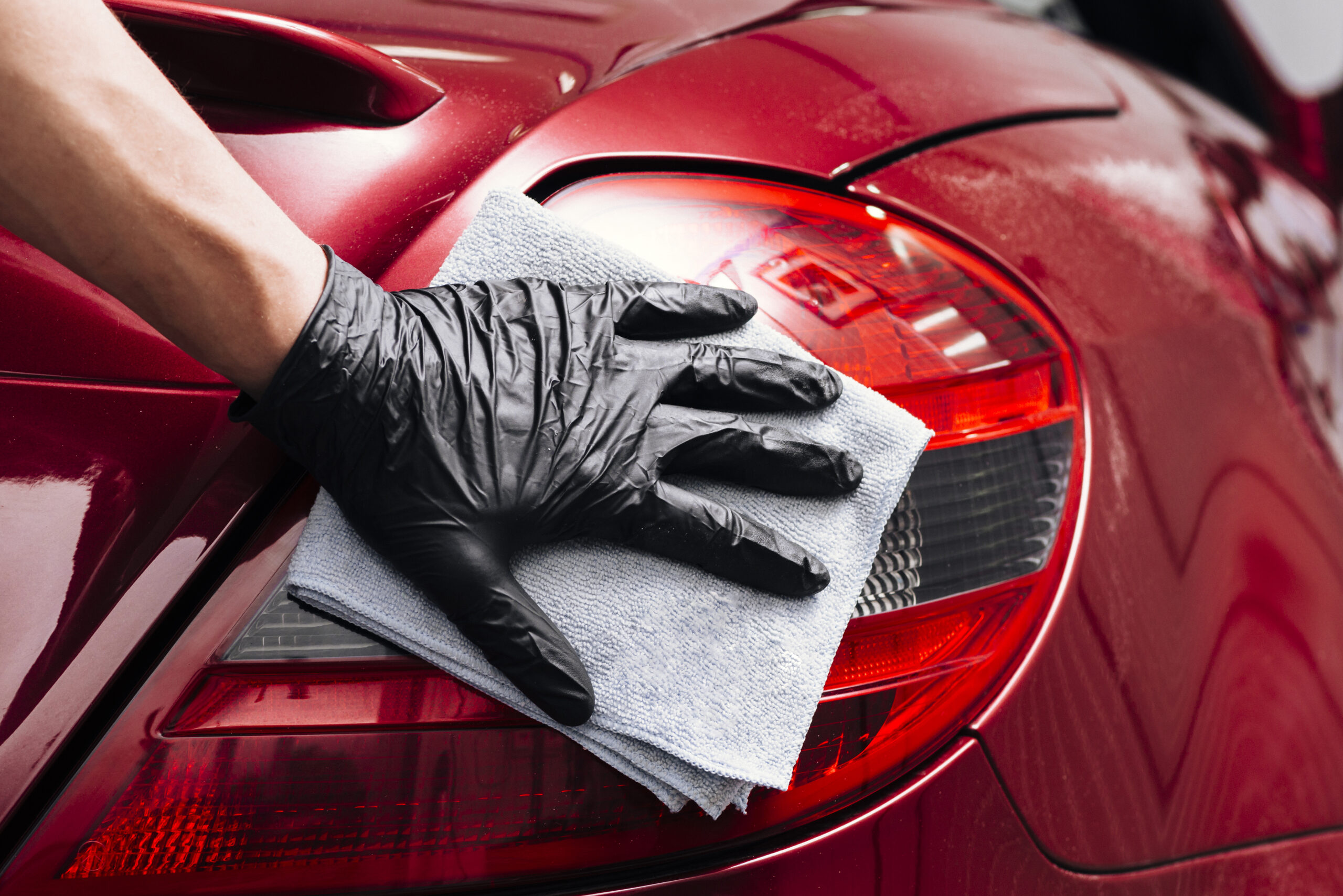 close-up-person-cleaning-car-exterior